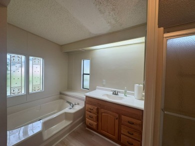 Welcome to one of the largest homes in the Meadows, just over 1 on Golden Lakes Golf Course in Florida - for sale on GolfHomes.com, golf home, golf lot