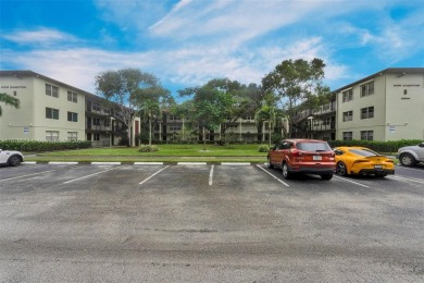 This inviting 2-bedroom, 1.5-bathroom condo on the 1st floor on Flamingo Lakes Country Club in Florida - for sale on GolfHomes.com, golf home, golf lot