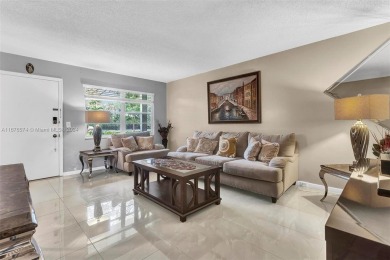 This inviting 2-bedroom, 1.5-bathroom condo on the 1st floor on Flamingo Lakes Country Club in Florida - for sale on GolfHomes.com, golf home, golf lot