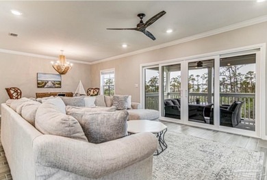 This beautifully furnished coastal residence is located in the on Lost Key Golf Club in Florida - for sale on GolfHomes.com, golf home, golf lot