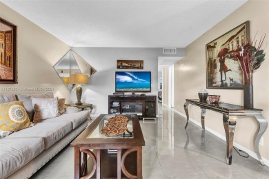 This inviting 2-bedroom, 1.5-bathroom condo on the 1st floor on Flamingo Lakes Country Club in Florida - for sale on GolfHomes.com, golf home, golf lot