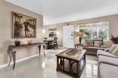 This inviting 2-bedroom, 1.5-bathroom condo on the 1st floor on Flamingo Lakes Country Club in Florida - for sale on GolfHomes.com, golf home, golf lot