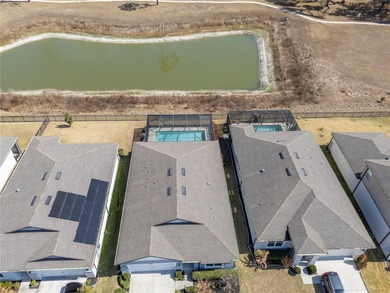 2021 BUILT POOL HOME with POND VIEWS, HURRICANE IMPACT WINDOWS on Silverado Golf and Country Club in Florida - for sale on GolfHomes.com, golf home, golf lot