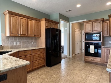 Tucked along the #8 fairway in Cherry Hill, this inviting villa on Cherry Hill Golf Club in Indiana - for sale on GolfHomes.com, golf home, golf lot