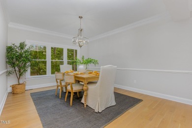 The heart of the home is a gorgeous custom kitchen with sleek on Brier Creek Country Club in North Carolina - for sale on GolfHomes.com, golf home, golf lot
