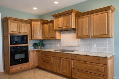 Tucked along the #8 fairway in Cherry Hill, this inviting villa on Cherry Hill Golf Club in Indiana - for sale on GolfHomes.com, golf home, golf lot