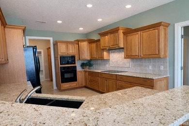 Tucked along the #8 fairway in Cherry Hill, this inviting villa on Cherry Hill Golf Club in Indiana - for sale on GolfHomes.com, golf home, golf lot