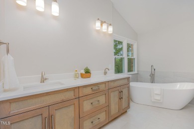 The heart of the home is a gorgeous custom kitchen with sleek on Brier Creek Country Club in North Carolina - for sale on GolfHomes.com, golf home, golf lot