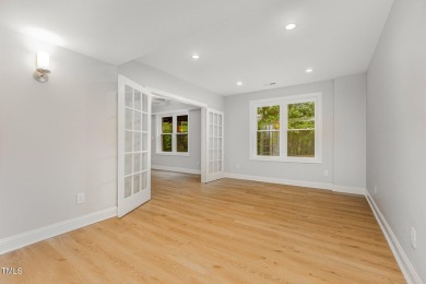 The heart of the home is a gorgeous custom kitchen with sleek on Brier Creek Country Club in North Carolina - for sale on GolfHomes.com, golf home, golf lot