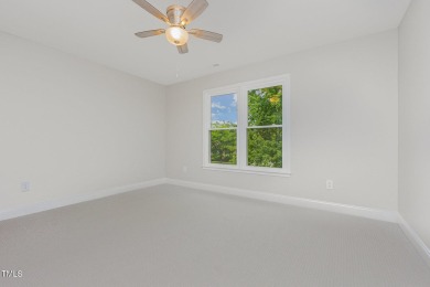 The heart of the home is a gorgeous custom kitchen with sleek on Brier Creek Country Club in North Carolina - for sale on GolfHomes.com, golf home, golf lot