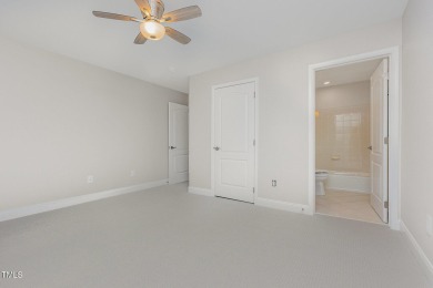 The heart of the home is a gorgeous custom kitchen with sleek on Brier Creek Country Club in North Carolina - for sale on GolfHomes.com, golf home, golf lot