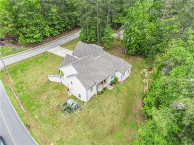 Beautiful Corner Lot Home with Unfinished Basement in Gated on Fairfield Plantation Golf and Country Club in Georgia - for sale on GolfHomes.com, golf home, golf lot