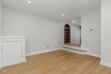 The heart of the home is a gorgeous custom kitchen with sleek on Brier Creek Country Club in North Carolina - for sale on GolfHomes.com, golf home, golf lot