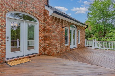 The heart of the home is a gorgeous custom kitchen with sleek on Brier Creek Country Club in North Carolina - for sale on GolfHomes.com, golf home, golf lot