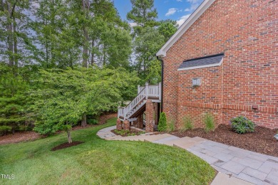 The heart of the home is a gorgeous custom kitchen with sleek on Brier Creek Country Club in North Carolina - for sale on GolfHomes.com, golf home, golf lot
