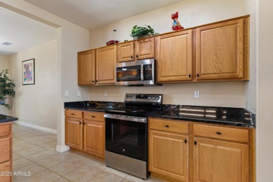 Highly upgraded Sun City Grand home with split floor plan & on Cimarron Golf Club in Arizona - for sale on GolfHomes.com, golf home, golf lot