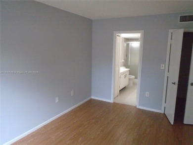 Excellent Opportunity in Inverrary! 2nd-floor 2-bedroom, 2-bath on Woodlands Country Club in Florida - for sale on GolfHomes.com, golf home, golf lot