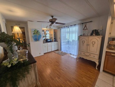 This beautifully furnished 1,344 sq. ft. home offers comfort and on Spanish Lakes Country Club in Florida - for sale on GolfHomes.com, golf home, golf lot