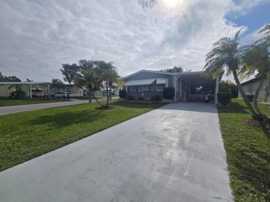 This beautifully furnished 1,344 sq. ft. home offers comfort and on Spanish Lakes Country Club in Florida - for sale on GolfHomes.com, golf home, golf lot