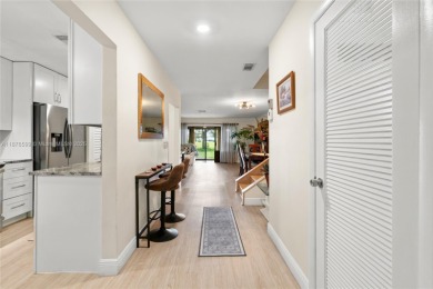 Beautifully updated 1,426 sqft two-story townhouse in the on Boca Lago Golf and Country Club in Florida - for sale on GolfHomes.com, golf home, golf lot