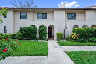 Beautifully updated 1,426 sqft two-story townhouse in the on Boca Lago Golf and Country Club in Florida - for sale on GolfHomes.com, golf home, golf lot