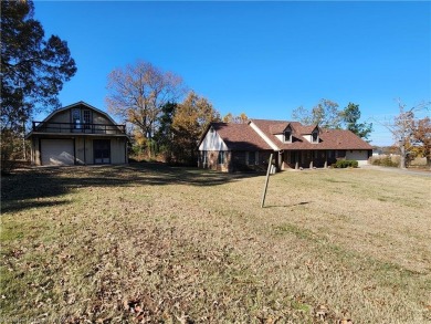 Nice 3 bedroom, 2 bath home on approx. 1.19-acre lot. Located on on Vache-Grasse Country Club in Arkansas - for sale on GolfHomes.com, golf home, golf lot