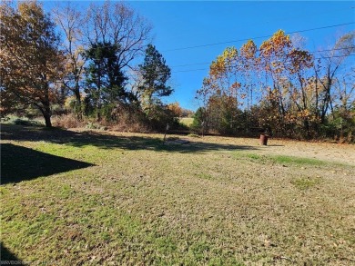 Nice 3 bedroom, 2 bath home on approx. 1.19-acre lot. Located on on Vache-Grasse Country Club in Arkansas - for sale on GolfHomes.com, golf home, golf lot