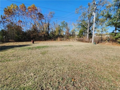 Nice 3 bedroom, 2 bath home on approx. 1.19-acre lot. Located on on Vache-Grasse Country Club in Arkansas - for sale on GolfHomes.com, golf home, golf lot