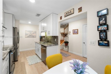 Beautifully updated 1,426 sqft two-story townhouse in the on Boca Lago Golf and Country Club in Florida - for sale on GolfHomes.com, golf home, golf lot