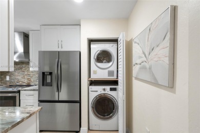 Beautifully updated 1,426 sqft two-story townhouse in the on Boca Lago Golf and Country Club in Florida - for sale on GolfHomes.com, golf home, golf lot