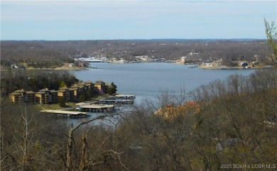 This ground-floor, 1-story, end unit enjoys easy access from the on Seasons Ridge At Four Seasons in Missouri - for sale on GolfHomes.com, golf home, golf lot