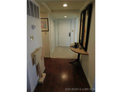 This ground-floor, 1-story, end unit enjoys easy access from the on Seasons Ridge At Four Seasons in Missouri - for sale on GolfHomes.com, golf home, golf lot