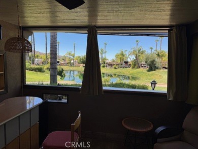 If stunning views make you smile, this property is guaranteed to on Rancho California RV Resort in California - for sale on GolfHomes.com, golf home, golf lot