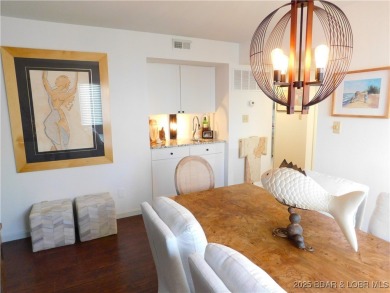 This ground-floor, 1-story, end unit enjoys easy access from the on Seasons Ridge At Four Seasons in Missouri - for sale on GolfHomes.com, golf home, golf lot