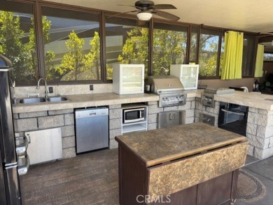 If stunning views make you smile, this property is guaranteed to on Rancho California RV Resort in California - for sale on GolfHomes.com, golf home, golf lot