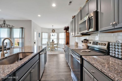 Welcome to this beautifully maintained coastal cottage located on Carolina National Golf Club in North Carolina - for sale on GolfHomes.com, golf home, golf lot
