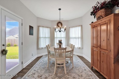 Welcome to this beautifully maintained coastal cottage located on Carolina National Golf Club in North Carolina - for sale on GolfHomes.com, golf home, golf lot