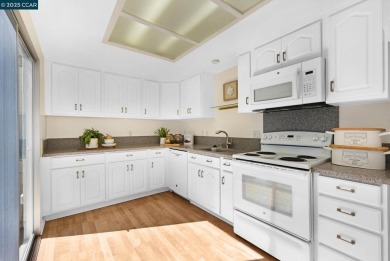 Discover this lovely Golden Gate model level in Rossmoor on Rossmoor Golf Course in California - for sale on GolfHomes.com, golf home, golf lot