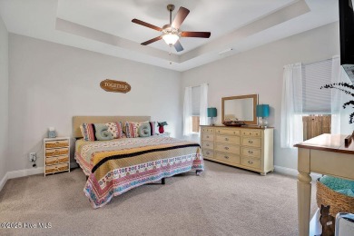 Welcome to this beautifully maintained coastal cottage located on Carolina National Golf Club in North Carolina - for sale on GolfHomes.com, golf home, golf lot