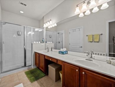 Discover the perfect blend of comfort and convenience in this on ChampionsGate Golf Resort in Florida - for sale on GolfHomes.com, golf home, golf lot