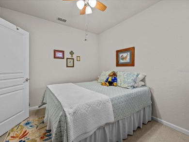 Discover the perfect blend of comfort and convenience in this on ChampionsGate Golf Resort in Florida - for sale on GolfHomes.com, golf home, golf lot