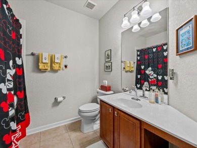Discover the perfect blend of comfort and convenience in this on ChampionsGate Golf Resort in Florida - for sale on GolfHomes.com, golf home, golf lot