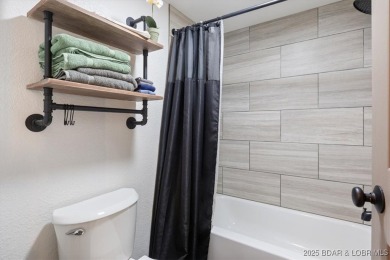 Welcome to this beautifully updated and move-in-ready home on The Oaks Golf Course in Missouri - for sale on GolfHomes.com, golf home, golf lot