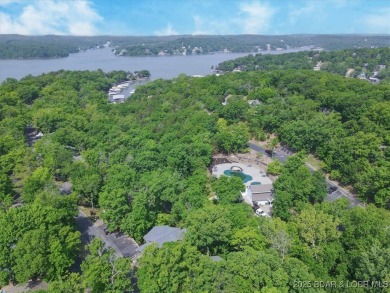 Welcome to this beautifully updated and move-in-ready home on The Oaks Golf Course in Missouri - for sale on GolfHomes.com, golf home, golf lot