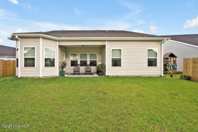 Welcome to this beautifully maintained coastal cottage located on Carolina National Golf Club in North Carolina - for sale on GolfHomes.com, golf home, golf lot