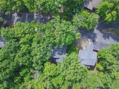 Welcome to this beautifully updated and move-in-ready home on The Oaks Golf Course in Missouri - for sale on GolfHomes.com, golf home, golf lot