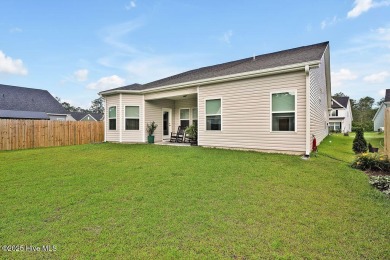 Welcome to this beautifully maintained coastal cottage located on Carolina National Golf Club in North Carolina - for sale on GolfHomes.com, golf home, golf lot