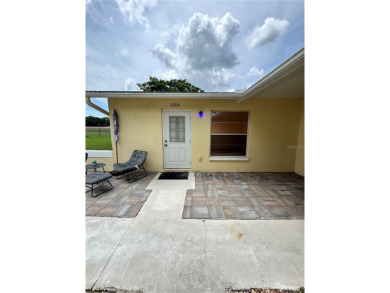 Make this BEAUTIFULLY FURNISHED well-kept 2-bedroom 2-bath in on Summertree Golf Course in Florida - for sale on GolfHomes.com, golf home, golf lot