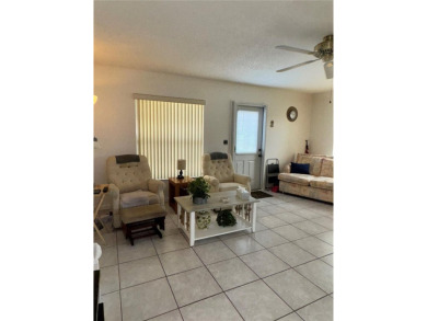 Make this BEAUTIFULLY FURNISHED well-kept 2-bedroom 2-bath in on Summertree Golf Course in Florida - for sale on GolfHomes.com, golf home, golf lot