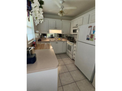 Make this BEAUTIFULLY FURNISHED well-kept 2-bedroom 2-bath in on Summertree Golf Course in Florida - for sale on GolfHomes.com, golf home, golf lot